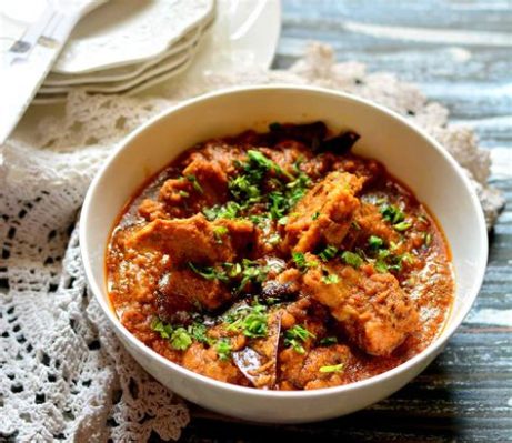 Mutton Rogan Josh: Een intens gekruide curry die smelt in je mond en je smaakpapillen een feestje bezorgt!